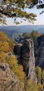 Scenic view of rocky mountains during autumn
