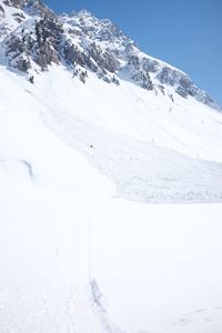 Snow covered mountains against sky