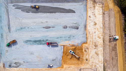 Aerial view of construction machinery on landscape