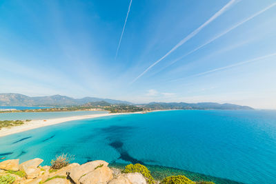 Scenic view of sea against blue sky