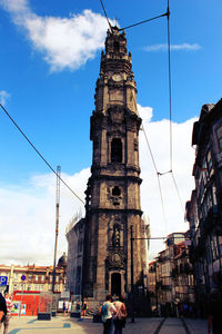 Clerigos church in city against sky