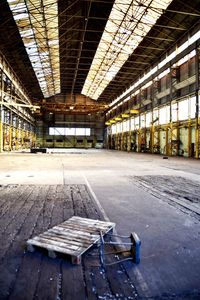 Empty benches in abandoned building