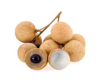 High angle view of pebbles against white background