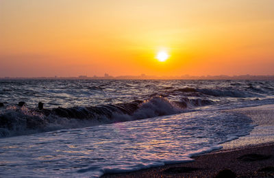 Scenic view of sea against sky during sunset