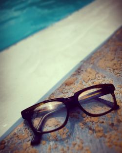 Close-up of sunglasses on table