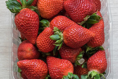 High angle view of strawberries on table