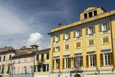 Low angle view of buildings against sky