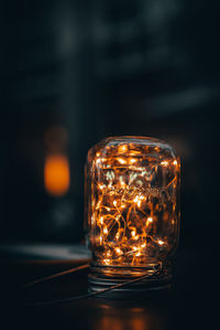 Close-up of illuminated light bulb