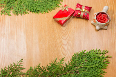 High angle view of christmas tree on hardwood floor