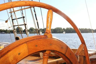 Close-up of cropped boat in lake against clear sky