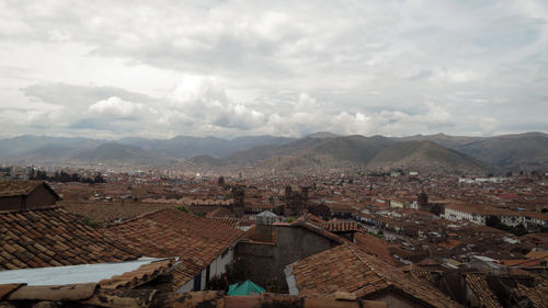 View of the city of cusco with its orange and andean roofs