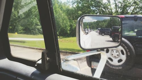 Reflection of car on road