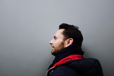 Young man against white background