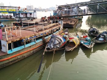 View of boats moored at harbor