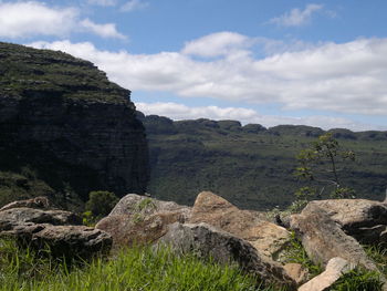 Scenic view of landscape against cloudy sky