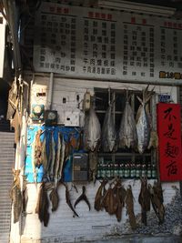 Clothes hanging in store for sale in market