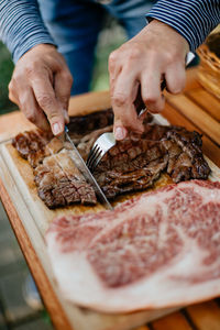 Close-up of man preparing food