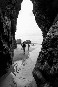 People walking on beach