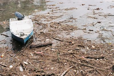 High angle view of garbage in shallow water