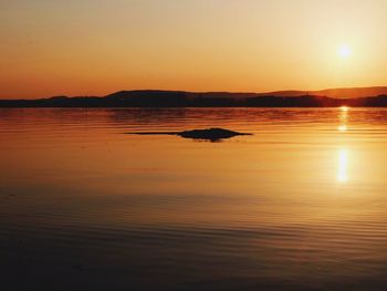 View of calm sea at sunset