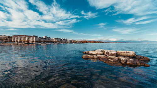 Rocks in water in geneva lake