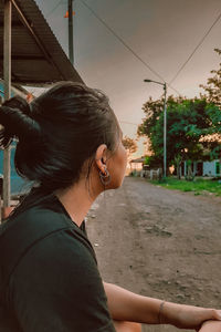 Side view portrait of a young woman