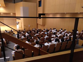 People sitting in auditorium