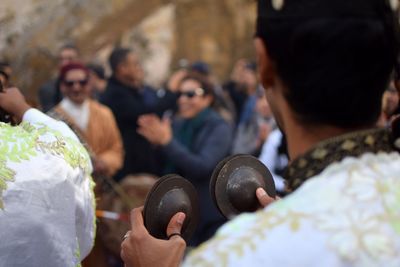 Rear view of people at temple