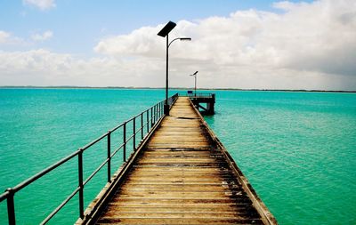 Scenic view of calm sea against clear sky