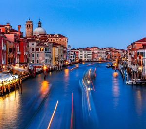 Canal passing through city buildings