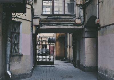 Alley amidst buildings in city