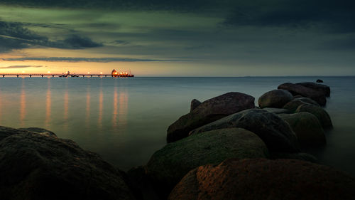 Scenic view of sea against sky during sunset