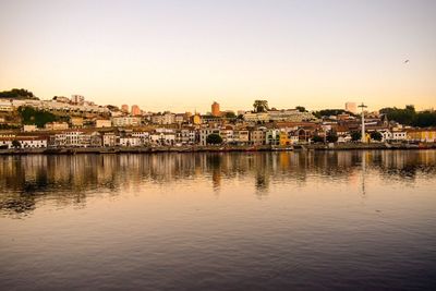 River by town against clear sky