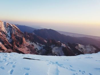 Scenic view of mountains against sky during sunset