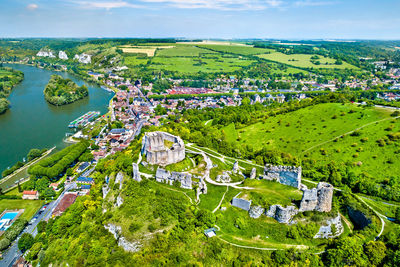 High angle view of buildings and trees in city