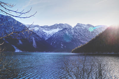 Scenic view of snowcapped mountains against sky