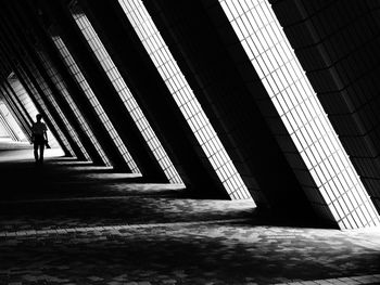 Man in corridor of building