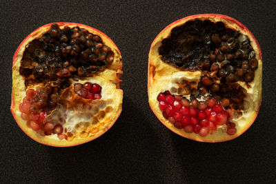 Directly above shot of breakfast on table against black background