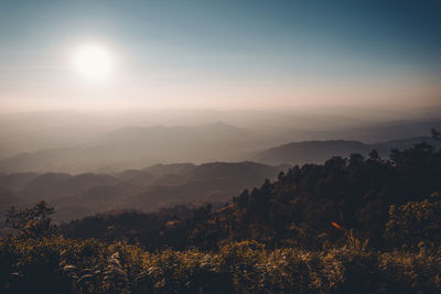 Scenic view of mountains against sky during sunset