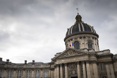 Low angle view of historic building against sky