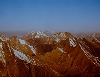 Scenic view of snowcapped mountain against sky