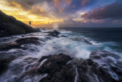 Scenic view of sea against sky during sunset