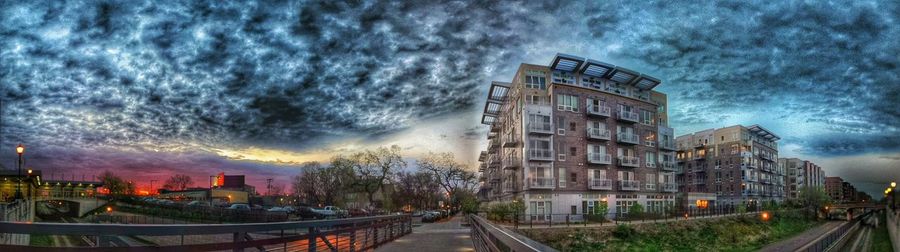 City street against cloudy sky