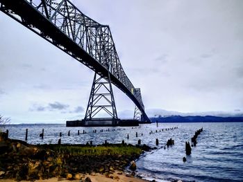 View of bridge over sea against sky