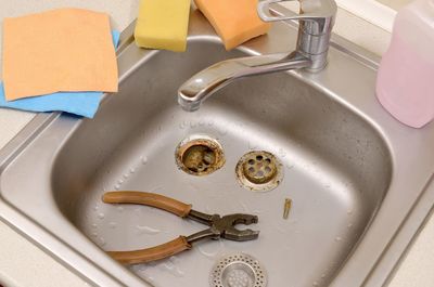 High angle view of faucet on table