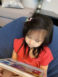 High angle view of cute girl at home