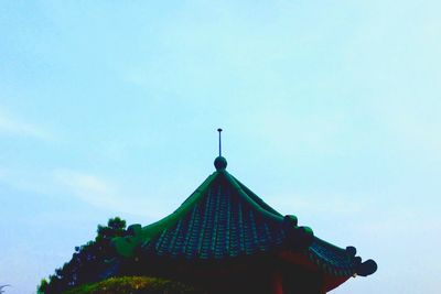 Low angle view of built structure against clear blue sky