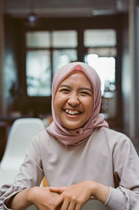 Portrait of a smiling young woman