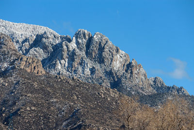 Scenic view of snowcapped mountain against sky. sandia mountains, albuquerque, new mexico