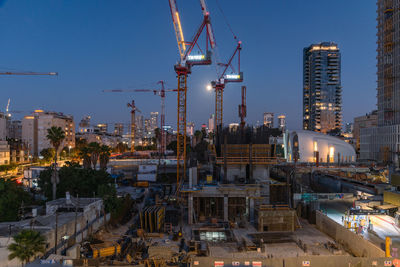 Illuminated buildings in city at night